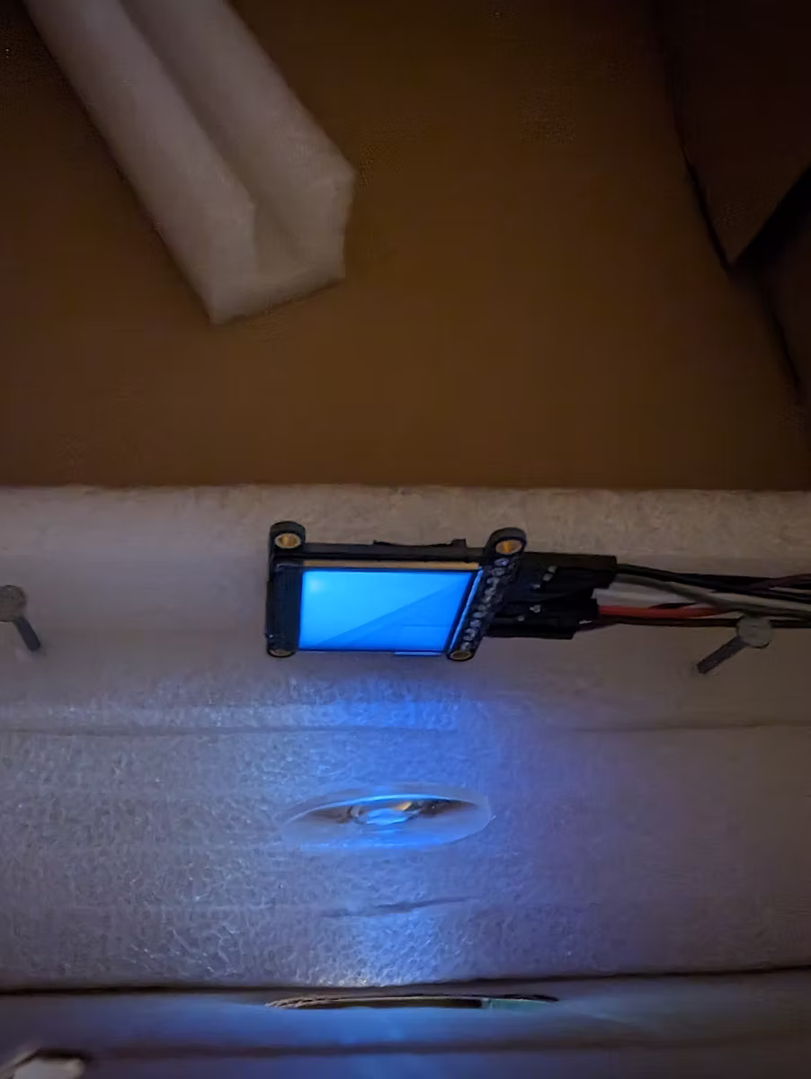 Lens testing setup with cardboard box